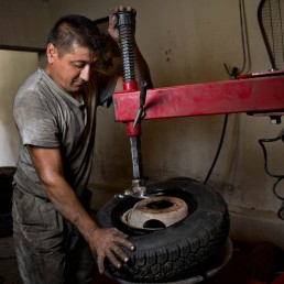 worker tires microcredit portrait